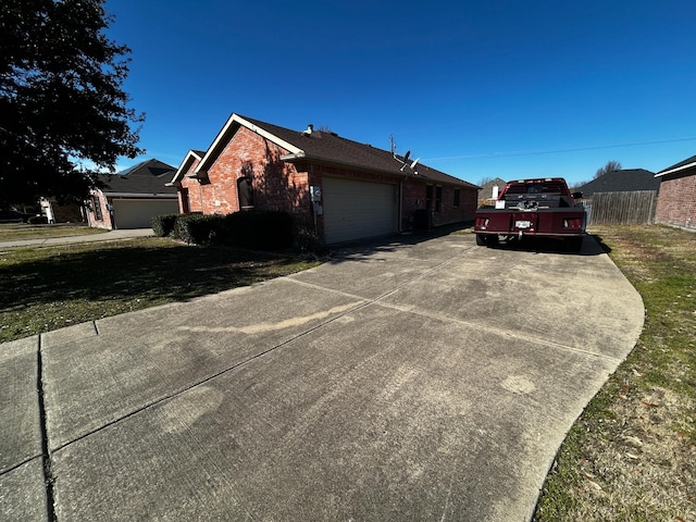 view of home's exterior with a garage