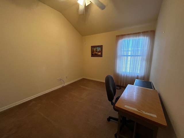 carpeted home office with ceiling fan and lofted ceiling