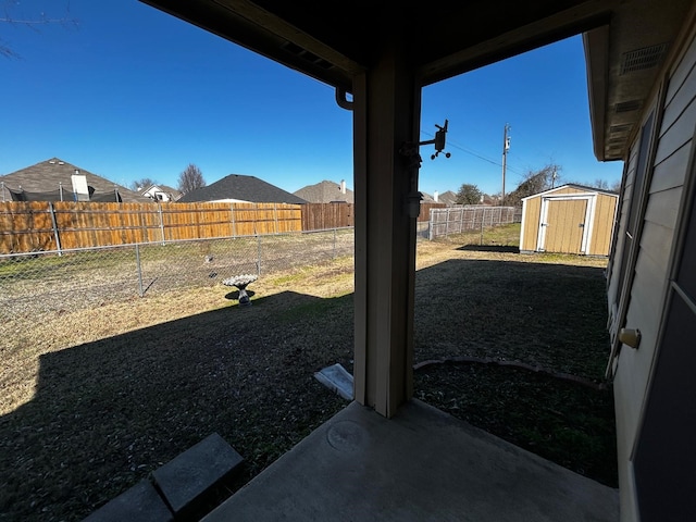 view of yard with a storage shed