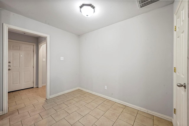 view of tiled spare room