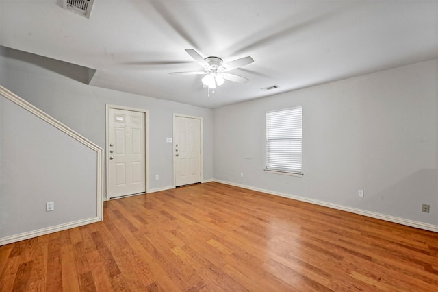 unfurnished room featuring ceiling fan and light wood-type flooring