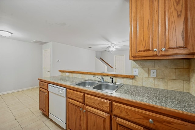 kitchen featuring light tile patterned flooring, dishwasher, sink, decorative backsplash, and ceiling fan