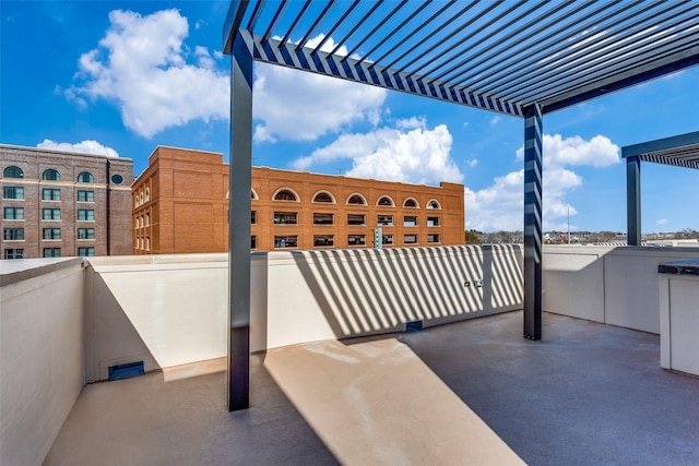 view of patio / terrace with a balcony