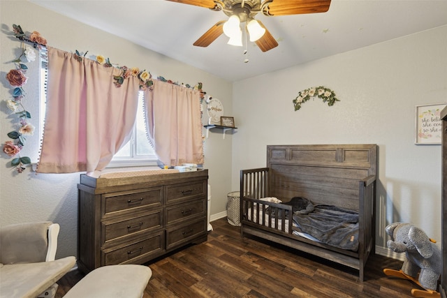 bedroom featuring dark wood-type flooring and ceiling fan