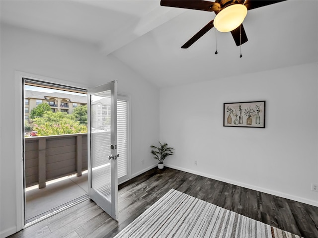 empty room with ceiling fan, dark hardwood / wood-style floors, and vaulted ceiling with beams