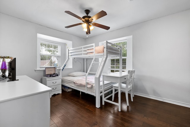 bedroom featuring ceiling fan and dark hardwood / wood-style floors