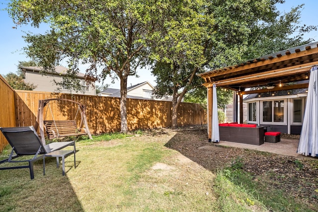 view of yard with an outdoor living space and a patio area