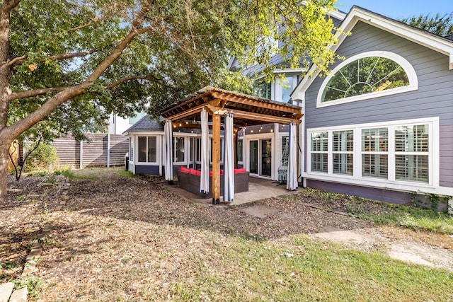 rear view of property with a patio