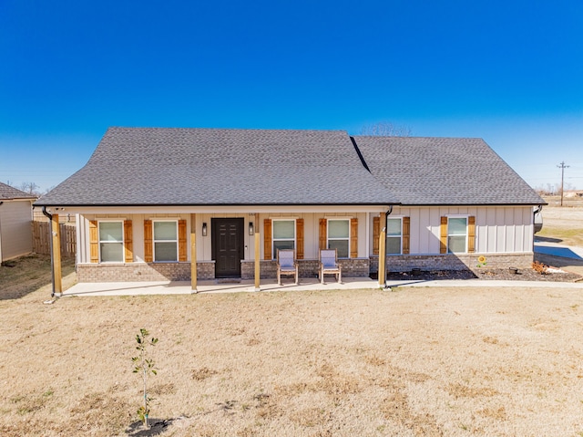 back of house with covered porch