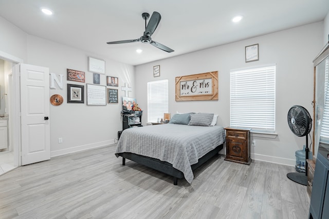 bedroom featuring ceiling fan and light hardwood / wood-style flooring