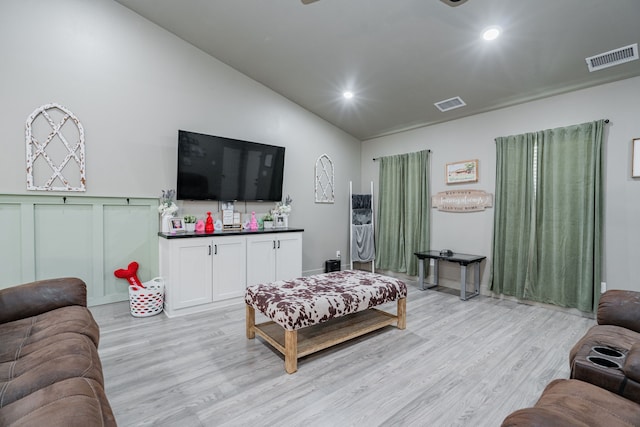 3010 Morris Rd, Mabank, TX 75147 - living area featuring vaulted ceiling, light wood finished floors, and recessed lighting