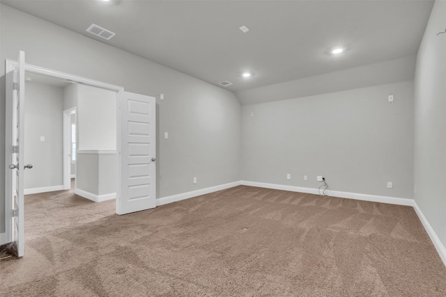 empty room with recessed lighting, visible vents, carpet floors, and baseboards