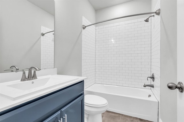 bathroom featuring vanity, toilet, and washtub / shower combination