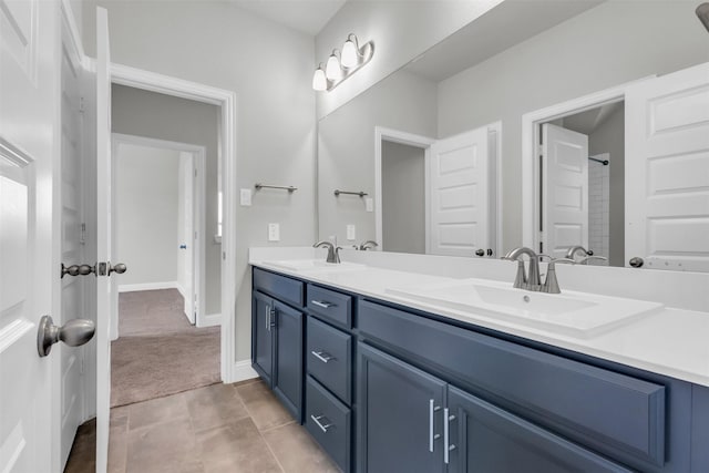 bathroom featuring vanity and tile patterned flooring