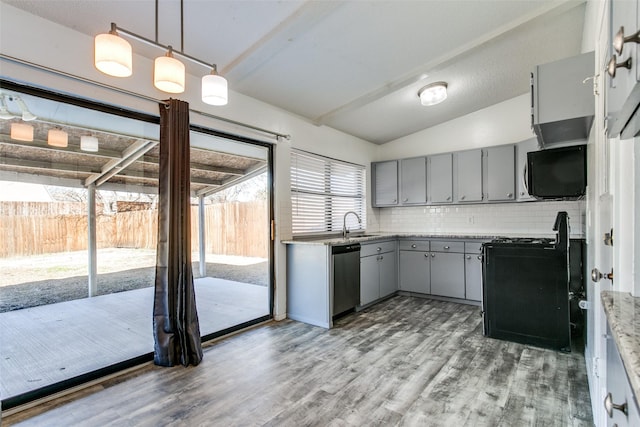 kitchen with hanging light fixtures, decorative backsplash, plenty of natural light, and dishwasher