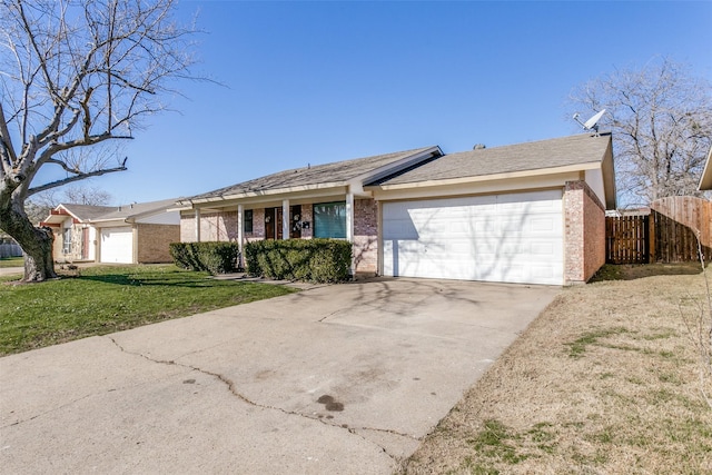 ranch-style home featuring a garage and a front yard