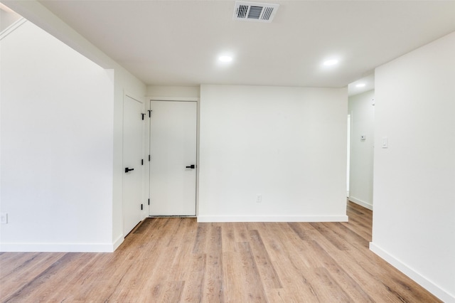 unfurnished room featuring light hardwood / wood-style flooring