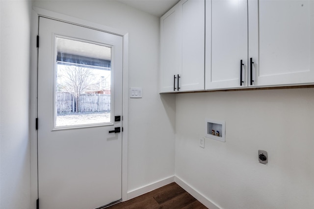 laundry room featuring cabinets, washer hookup, hookup for an electric dryer, and dark hardwood / wood-style flooring