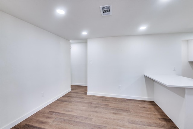 basement with light wood-type flooring