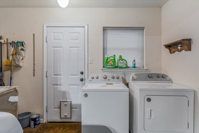 laundry room with separate washer and dryer