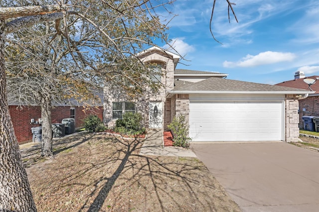 view of front of property with a garage