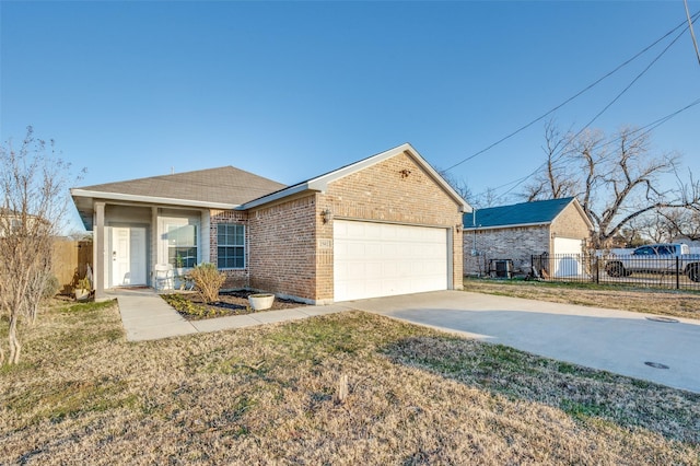 single story home with a garage and a front yard