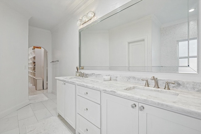 bathroom with vanity and crown molding