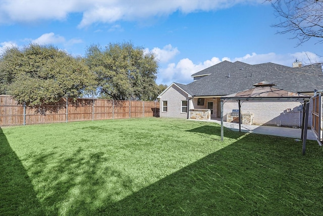 view of yard with a gazebo and a patio