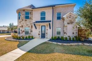 view of front of house with a front yard