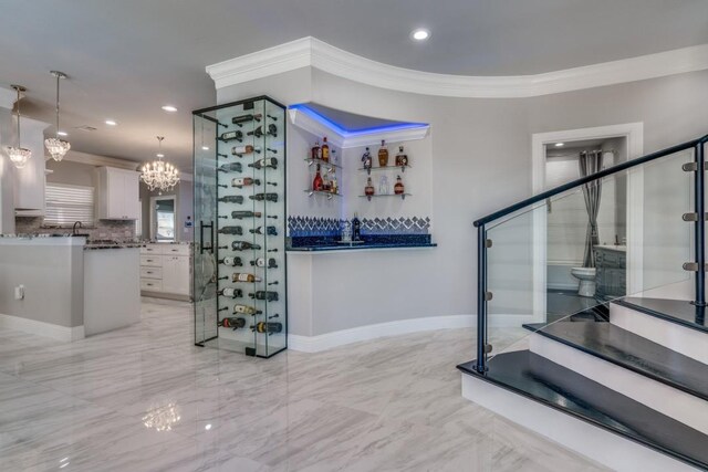 wine room with crown molding