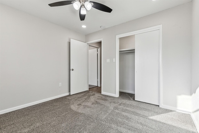 unfurnished bedroom with ceiling fan, carpet floors, and a closet