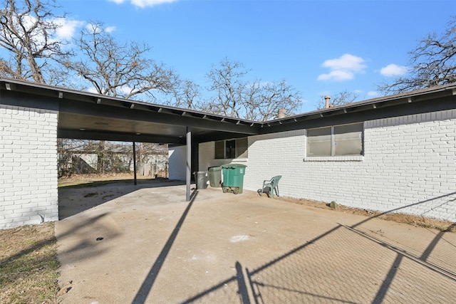 exterior space featuring a carport