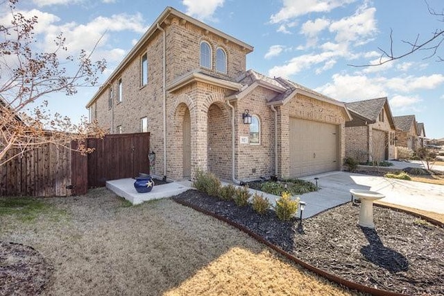 view of front of property featuring a garage