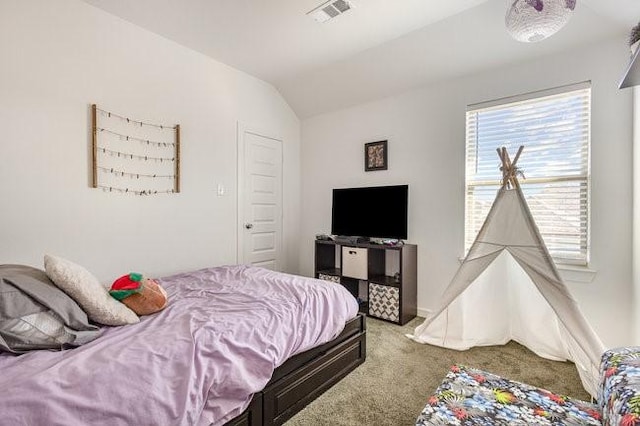 carpeted bedroom featuring vaulted ceiling