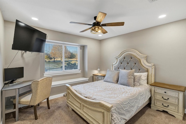 carpeted bedroom featuring ceiling fan