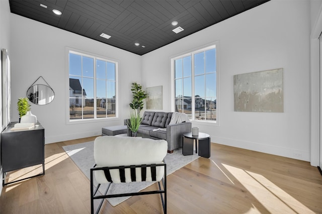 interior space featuring wood ceiling and light wood-type flooring