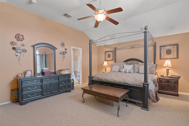 carpeted bedroom featuring lofted ceiling, a textured ceiling, and ceiling fan