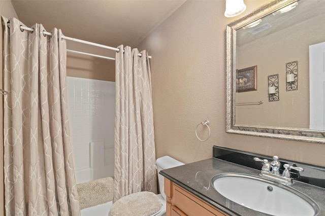 full bathroom with shower / bathtub combination with curtain, vanity, and toilet