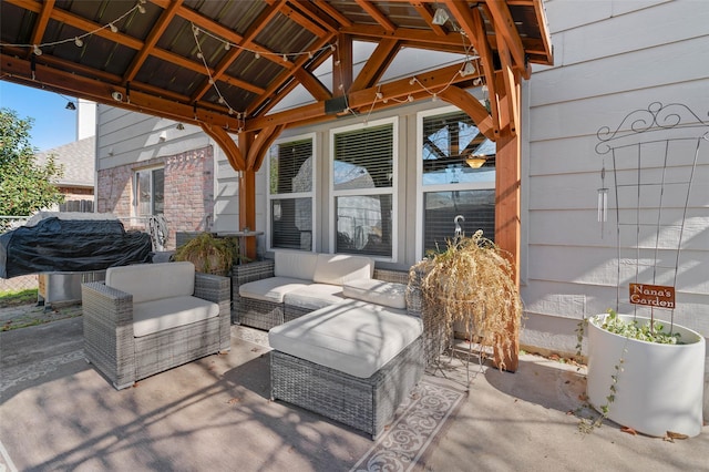 view of patio with a gazebo, grilling area, and outdoor lounge area