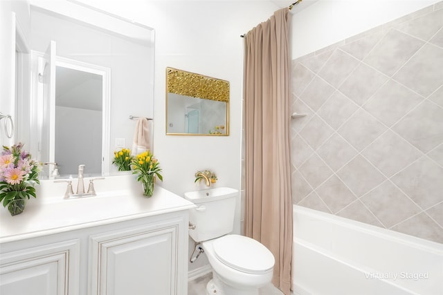 full bathroom with vanity, toilet, and shower / bath combo with shower curtain