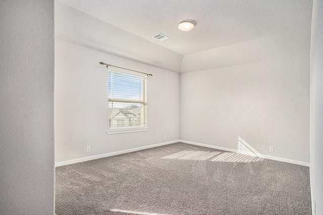 spare room featuring carpet flooring