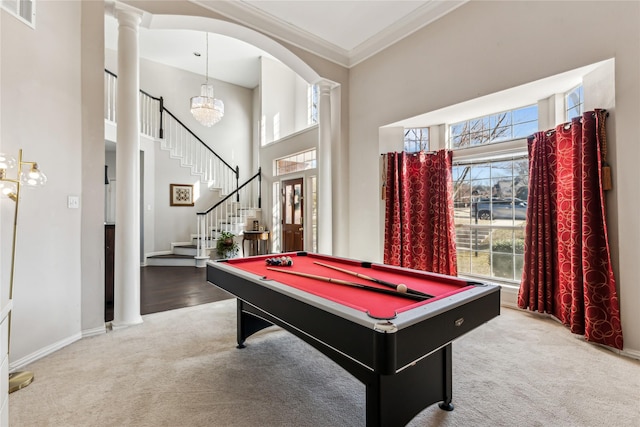 recreation room with carpet floors and decorative columns