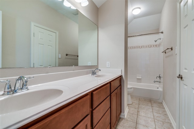 full bathroom with vanity, tile patterned flooring,  shower combination, and toilet