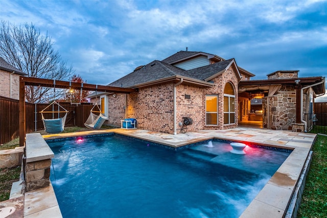 view of pool featuring a patio area