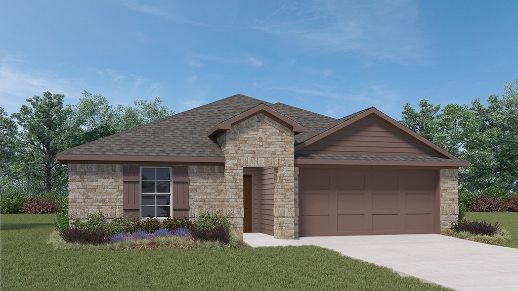 view of front of home featuring a garage and a front lawn