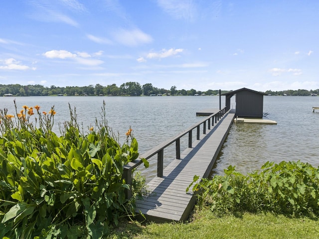 view of dock with a water view