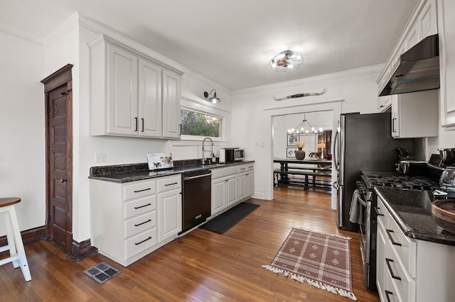 kitchen with white cabinets, black dishwasher, dark wood-type flooring, and stainless steel gas range