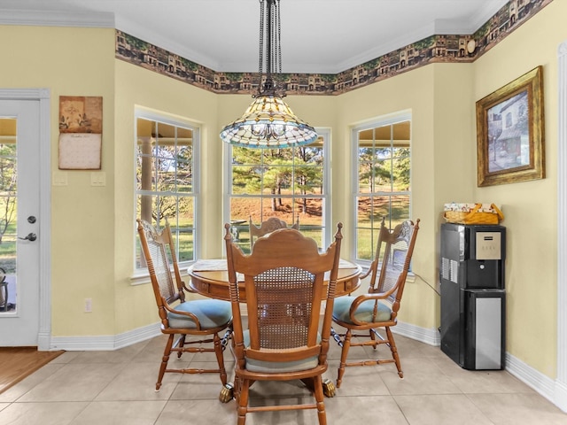 tiled dining space with ornamental molding