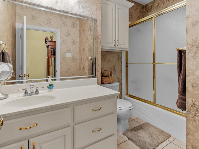 full bathroom with enclosed tub / shower combo, toilet, tile patterned floors, and vanity