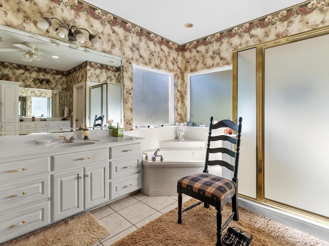 bathroom with tile patterned flooring, vanity, separate shower and tub, and ceiling fan